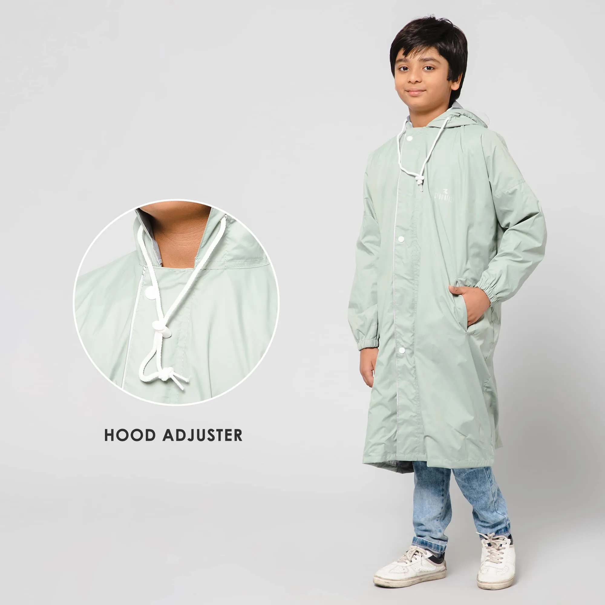 THE CLOWNFISH Cloud Chaser Series Kids Raincoat Waterproof Polyester Double Coating Reversible Longcoat with Hood and Reflector Logo at Back. Printed Plastic Pouch. Kid Age-9-10 years (Pista Green)