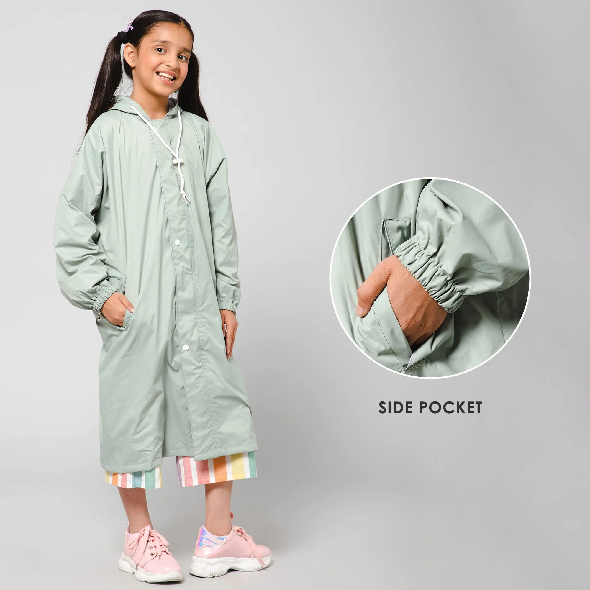 THE CLOWNFISH Cloud Chaser Series Kids Raincoat Waterproof Polyester Double Coating Reversible Longcoat with Hood and Reflector Logo at Back. Printed Plastic Pouch. Kid Age-9-10 years (Pista Green)